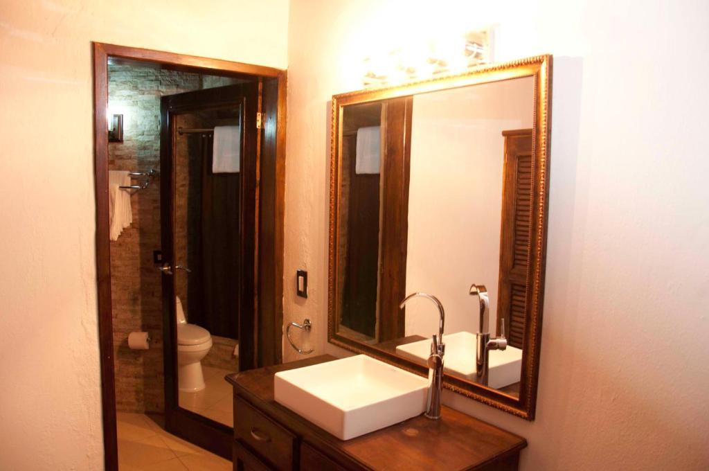 La Maison Hotel Porto Príncipe Quarto foto