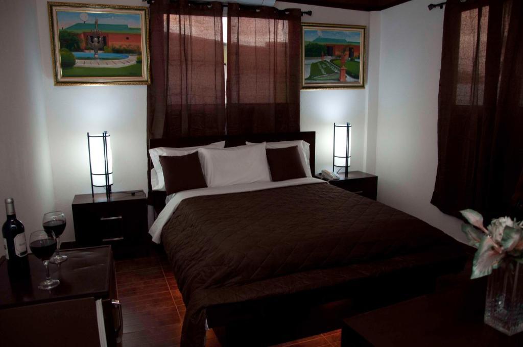 La Maison Hotel Porto Príncipe Quarto foto