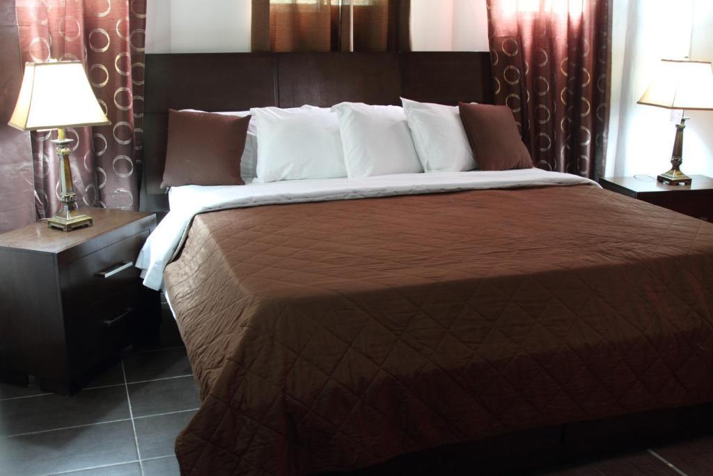 La Maison Hotel Porto Príncipe Quarto foto